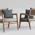 Modern Armchairs With Wooden Frame Woven Backrest Light Colored Cushions And Dark Pillows
