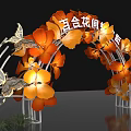 Event Entrance Arch Decorated With Orange Flowers And Butterflies