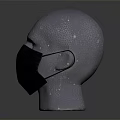 White Mannequin Head Wearing Black Face Mask With Small Dots On Dark Background