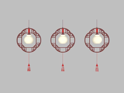 Three Hanging Ornaments With Circular Red Frame White Center And Red Tassels 3d model