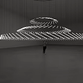Modern Suspended Art Installation With Illuminated Circular White Line Structures In Gallery Space