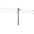 Row of Telephone Poles With Street Lamps Under Clear Blue Sky On Empty Ground