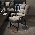Modern Home Office Desk Setup With Comfortable Gray Chair And Bookshelf