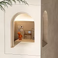 Light Colored Interior Space With Arched Doorway Orange Bear Sculpture Table Mirror Paintings And Plant