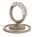 Decorative Garden Ornament With Circular Ring Happy Lettering And Pebble Base