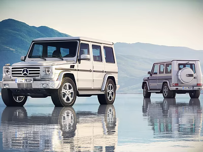 Two Silver Mercedes G Class SUVs Parked on Reflective Water Surface With Mountain Range Background 3d model
