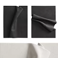 Soft Light Colored Fabrics With Folded Details On White Background Surface