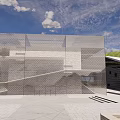 Modern Museum Building Featuring Glass Facade Geometric Design And Open Plaza