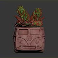 Colorful Succulent Plants In Pink Bus Shaped Planter With Green Red Leaves