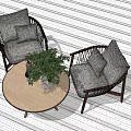 Woven Rattan Leisure Chairs With Wooden Frame Gray Cushions Round Coffee Table And Decorative Plants