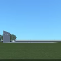 Modern Entrance Gate with Adjacent Building Wall Landscaped Gardens Trees Pedestrians and Nearby Cars