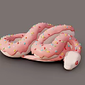 Cute Pink Donut Shaped Snake Covered With Colorful Sprinkles on Gray Background
