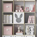 Modern Rabbit Ear Design Bookshelf With Pink White Storage Boxes And Gold Frame