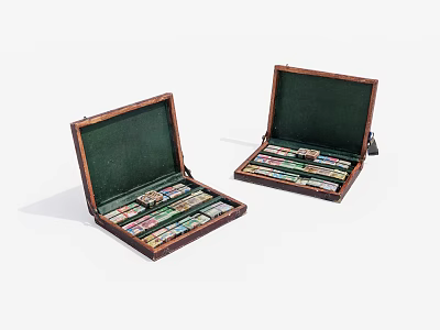 Two Open Wooden Cases With Green Interiors And Colorful Items Inside 3d model