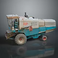 Blue And White Agricultural Harvester With Large Wheels And Cabin Structure