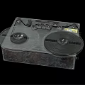Vintage Reel to Reel Tape Recorder with Silver Metal Body and Control Knobs