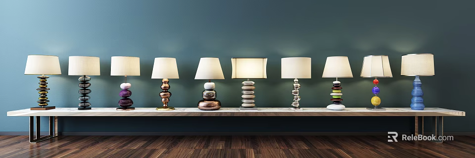 Unique Shaped Table Lamps With Stacked Colored Bases White Shades On Shelf Against Teal Wall 3d model 