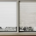 White Window Blinds Covering Home Windows With Beautiful Natural Outdoor View