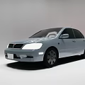 Silver Modern Four Door Sedan With Sleek Front Grille And Alloy Wheels