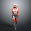 Woman with long blonde hair in silver top skirt and knee-high boots on gray background