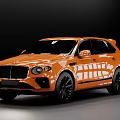 Orange Bentley SUV With Shiny Exterior And Black Alloy Wheels