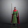 Medieval Warrior In Green Robe With Red Cape Holding Long Spear