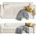 Cozy Beige Sectional Sofa With Decorative Throw Pillows And Checkered Blanket