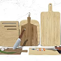 Various Wooden Cutting Boards With Chef Knife Garlic And Fresh Ingredients On Kitchen Counter