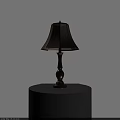 Classic Brown Wooden Table Lamp With Beige Fabric Shade On Round Metal Table