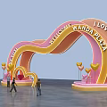 Pink and Yellow Archway with LOVE YUXI WELCOME WANDA PLAZA Heart Decorations and People Walking