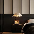 Modern Black Nightstand With Table Lamp Photo Frame And Feather Pendant Light Near Bed