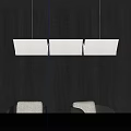 Three Rectangular White Pendant Lights Hanging Above Dark Wooden Dining Table 3d model