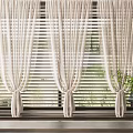 White Curtains With Tie Top Design Against Striped Blinds By Window With Green Plants