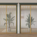 Sliding Doors with Golden Geometric Grid Design in Modern Indoor Space with Green Plants
