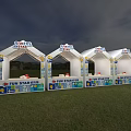 Three White Tent Like Booths For Fun Starfest On Grass Field With Blue Yellow Decorations