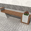 Public Bench With Wooden Seat And Concrete Base Near Colorful Flower Pots On Paved Ground