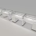 Jewelry Store Showcases with White Bases and Glass Tops Arranged in Row