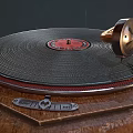 Vintage Gramophone with Brass Horn and Vinyl Records on Wooden Base