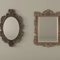 Two Oval and Square Mirrors with Ornate Carved Frames on Light Gray Wall 3d model