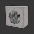 White Cube Shaped Speaker With Circular Grid Front Panel And Modern Design