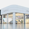 Modern JAECOO SMOODA Car Showroom Exterior With Glass Facade And Displayed Vehicles