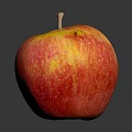 Fresh Ripe Red and Yellow Apple on Black Background with Reflection