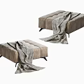 Two Modern Beige Upholstered Ottomans with Black Legs and Gray Blanket