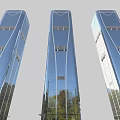 Modern Tall Office Buildings With Glass Curtain Walls And Tree Reflections