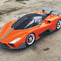 Orange Supercar With Sleek Design Black Roof And Rear Spoiler On Gravel Ground