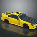 Yellow Modified Racing Car With Black Stripes KICKER Logo And Sponsor Decals