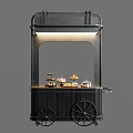 Dessert Shop Black Mobile Cart With Lit Top Wheels And Displayed Pastries