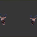 Two Brown Reindeer Figurines With Red Nose And Antlers On Gray Reflective Surface