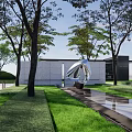 Modern Residential Landscape Design With Trees Lawn Sculpture And Water Feature