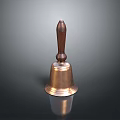 Vintage Brass Bell With Polished Wooden Handle On Reflective Black Surface